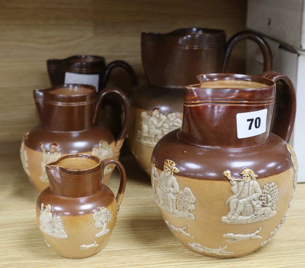 A set of five Royal Doulton graduated stoneware jugs, tallest 19cm